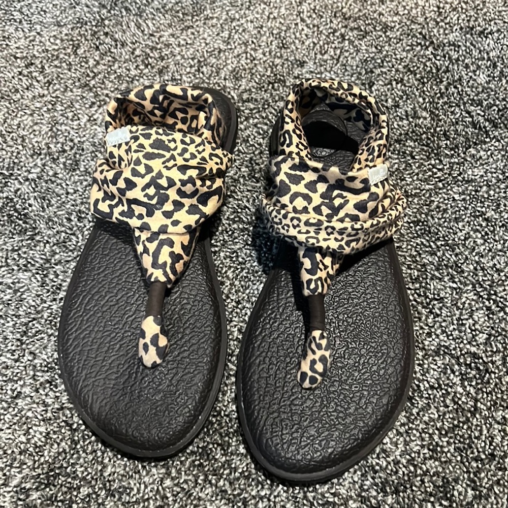 Never worn Sanuk sandals